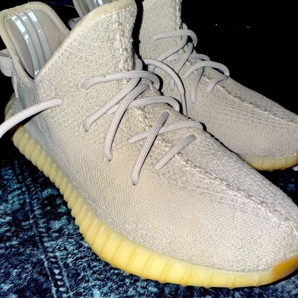 The Adidas and Yeezy 350 V2 sesame/men’s size 9:42